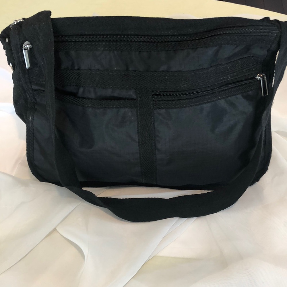 Black travel purse nylon material no tags